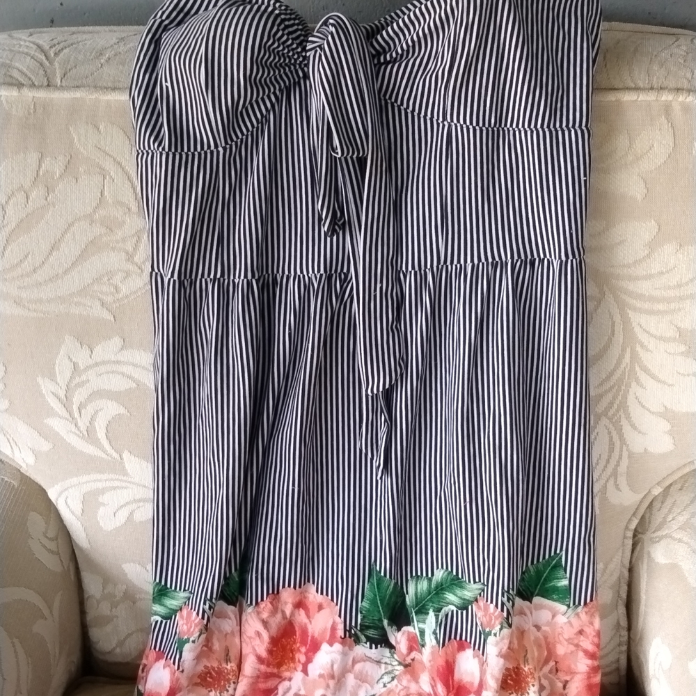 Black and white striped strapless dress with Peach flowers around the bottom